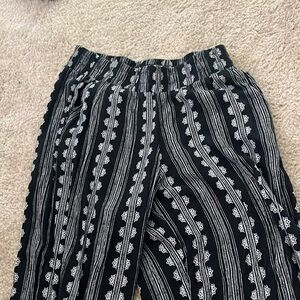 Black cool hippy pants. Elastic waisted. Small size very flexible and comfy.